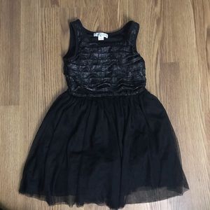 Black with ruffled top dress. Size 7.